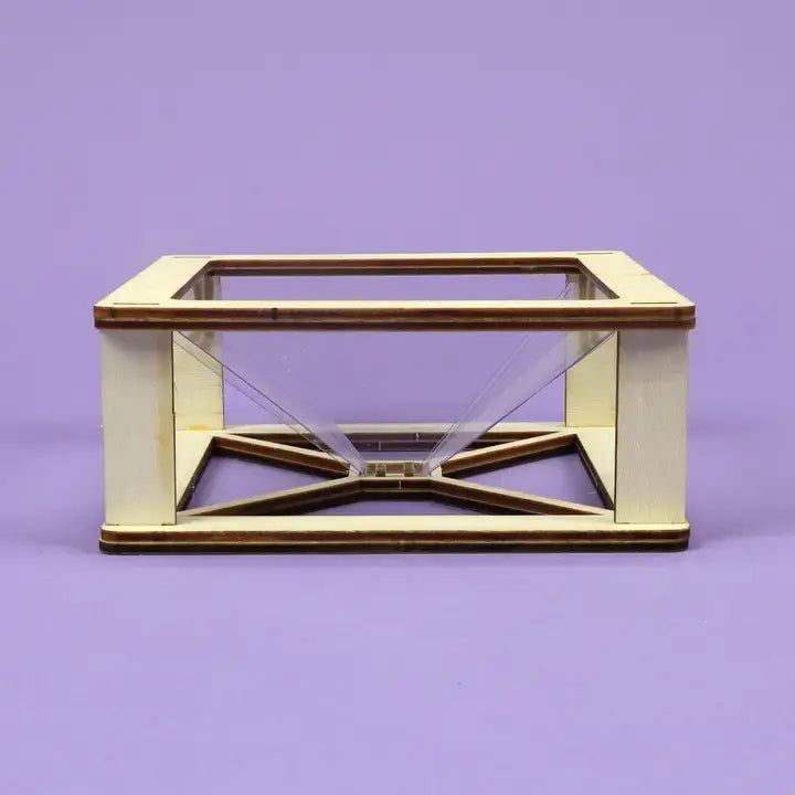 Glass display case with wooden frame on a purple background DIY kids hologram kit