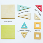 Set of wooden magnetic geometric shape blocks including base plates, triangles, and squares on a white background.