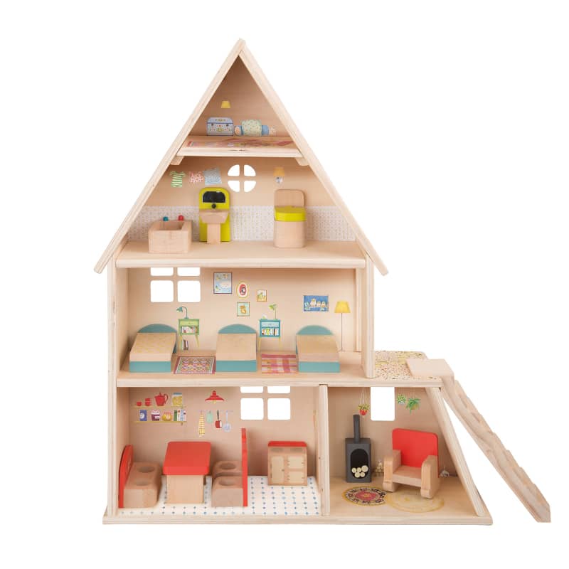 Wooden dollhouse with various rooms and furniture on a white background
