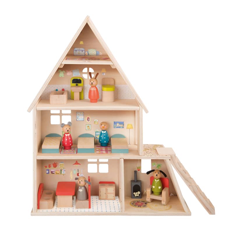 Wooden dollhouse with various rooms and furniture on a white background
