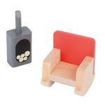 Wooden toy armchair with a red backrest and a small gray storage box with white balls on a white background.